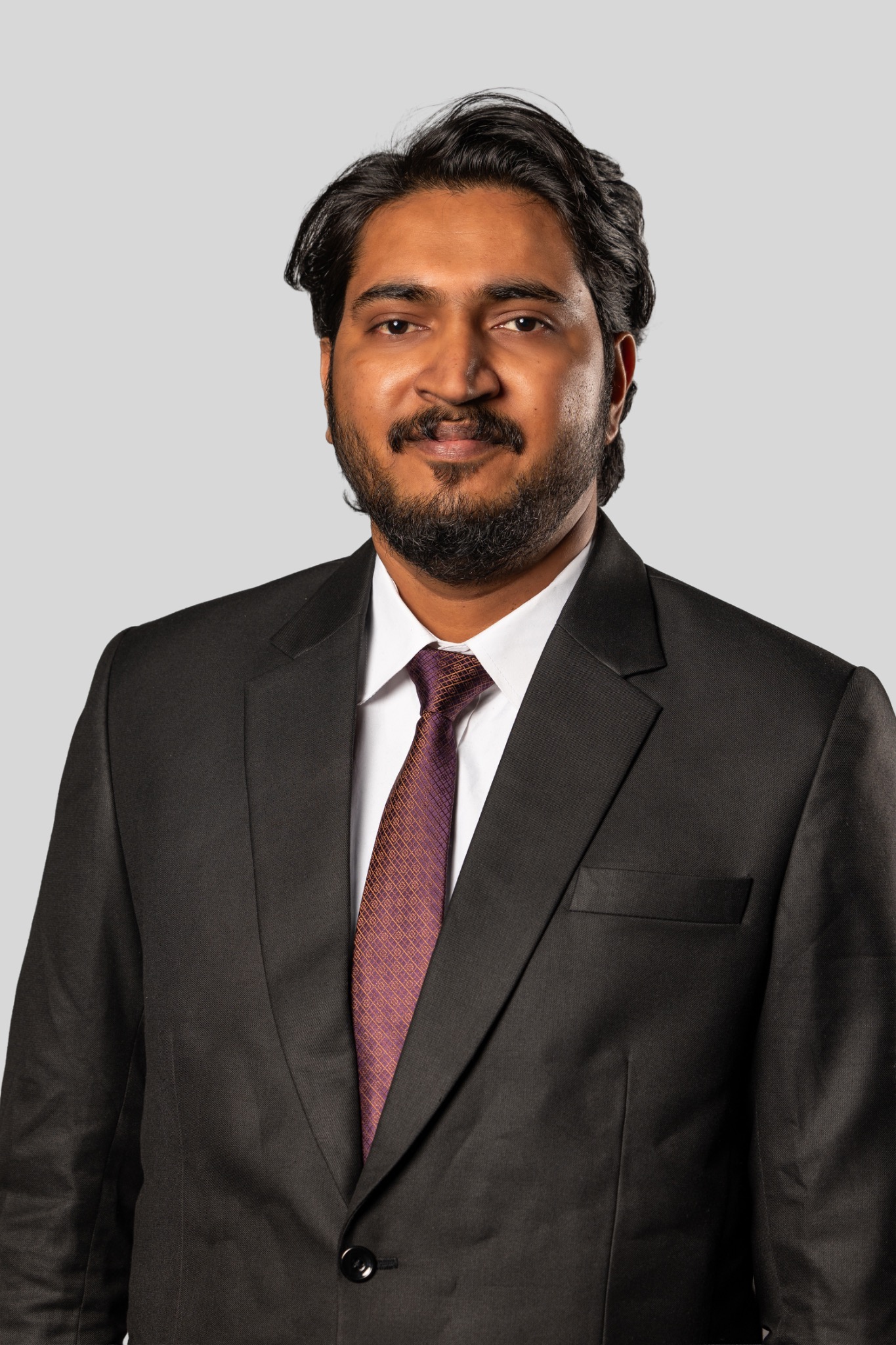 Professional portrait of Richu Harees
